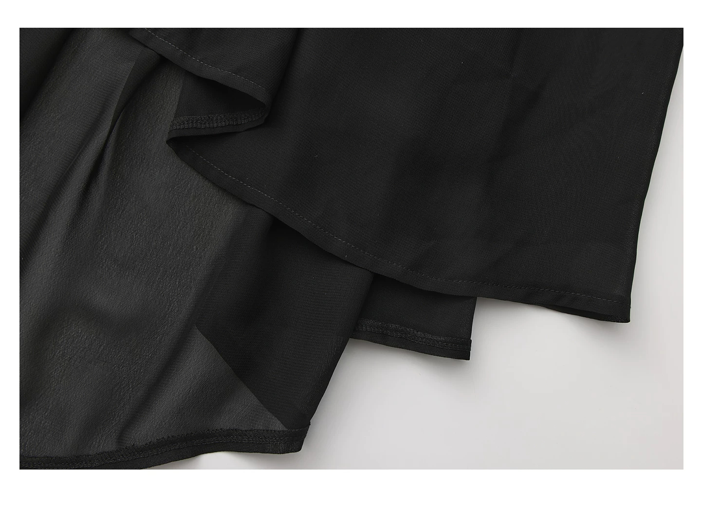 Layered sheer hem detail